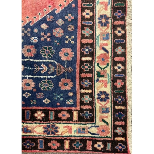 1556 - An early 20th century Northwest Persian Islamic Afshar floor carpet rug having a central medallion o... 