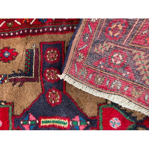 1559 - A vintage mid 20th century Persian Islamic Hamadan style rug carpet having a thick wall pile with tw... 