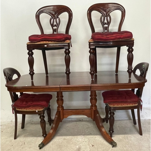 1661 - A 20th century Victorian revival mahogany dining table and four chairs. The chairs each having pierc... 