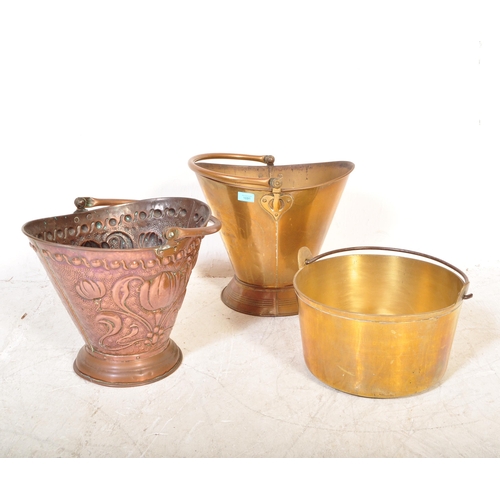 1691 - A collection of three  19th century copper and brass fireside items to include two coal scuttles - o... 