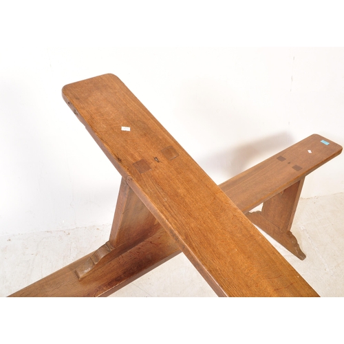 1695 - A pair of 19th century French refectory pig benches. Each with shaped single plant tops of fruitwood... 