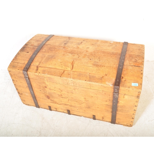 1696 - A 19th century Victorian pine dome top blanket box chest. The chest having a domed lid with metal ba... 