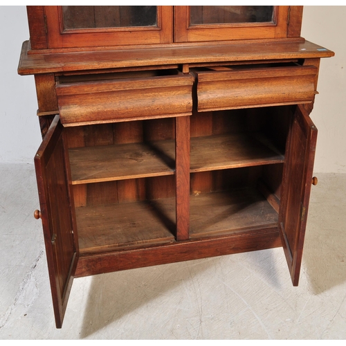 1700 - Victorian 19th century mahogany library bookcase cupboard. Raised on plinth base with cupboard and s... 