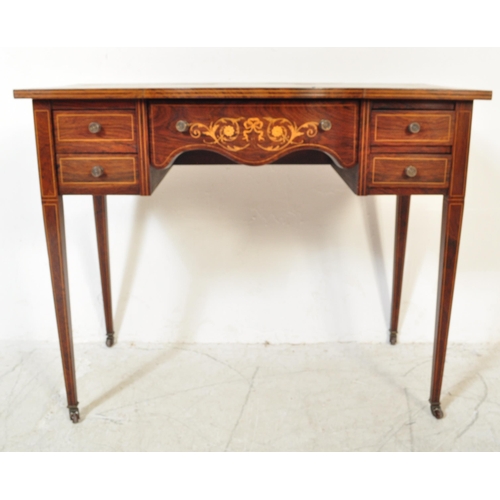 1706 - Edwardian rosewood and leather inlaid writing table desk. Raised on square tapering legs with arched... 