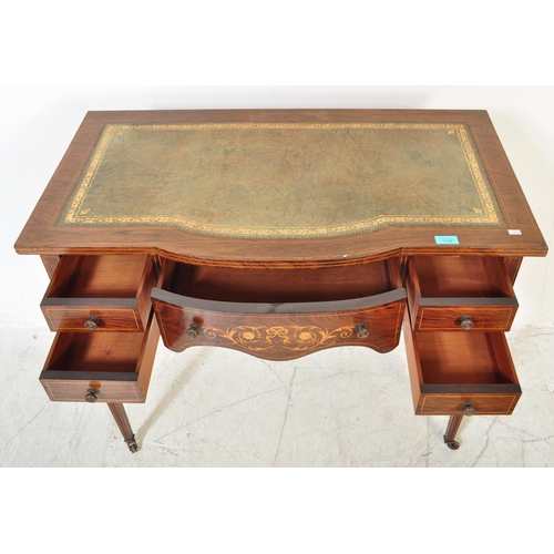 1706 - Edwardian rosewood and leather inlaid writing table desk. Raised on square tapering legs with arched... 