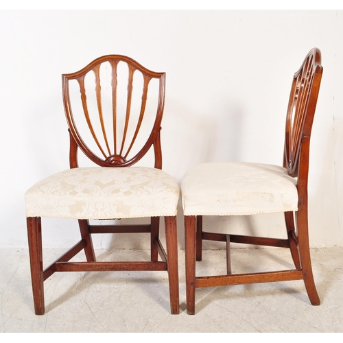 1718 - A set of seven 19th century mahogany dining chairs to include two Hepplewhite back dining chairs alo... 