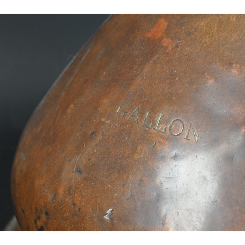 1730 - A Victorian 19th century  copper lidded urn having being fitted with white metal tap and having carr... 