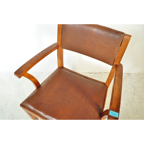 1733 - A vintage 20th Century circa 1930's oak office desk chair. With a leather back rest, leather seat cu... 