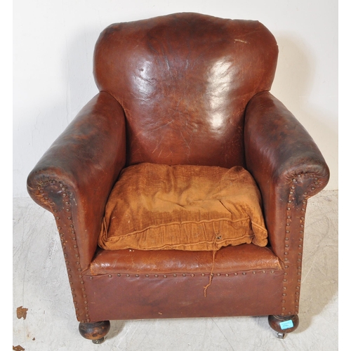 1744 - A vintage early 20th Century circa 1910's lounge / fire place chair. With large overstuffed back res... 