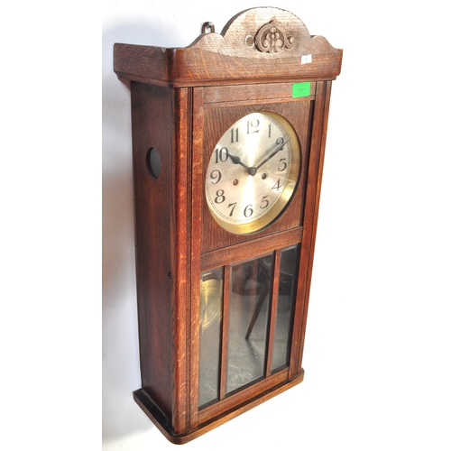 1753 - A vintage early 20th Century oak wall clock and two regency revival items. 

The clock having a silv... 