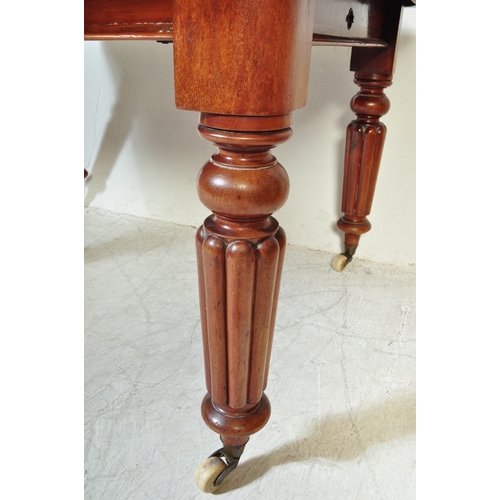 1756 - Early Victorian 19th century mahogany twin leaf extending dining table. Raised on reeded baluster fl... 