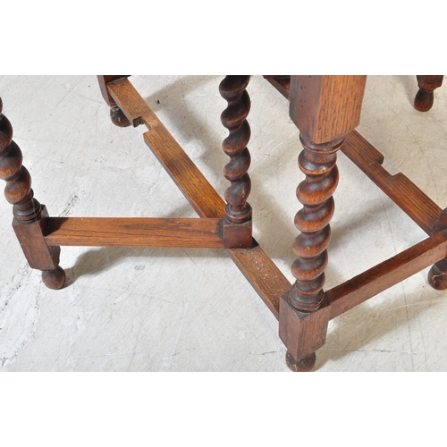 1757 - A 19th Century Victorian oak gateleg table with x2 drop leaves. The table having two swing out gate ... 