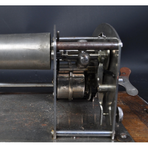 1758 - A 20th century clockwork watch makers lathe. Held within an oak carry case.  Appears in full working... 