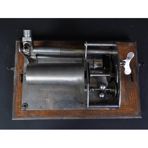 1758 - A 20th century clockwork watch makers lathe. Held within an oak carry case.  Appears in full working... 