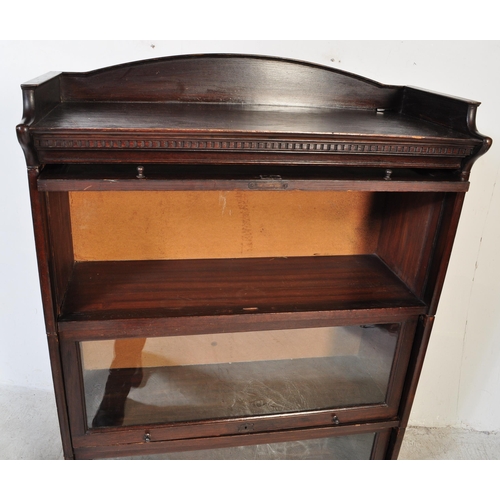 1765 - Harris Lebus - 'The Lebus Bookcase' - An early 20th century mahogany barristers bookcase having a se... 