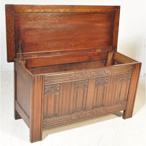 1774 - A 17th century revival carved oak coffer chest with linen fold and rose carved front panel being rai... 