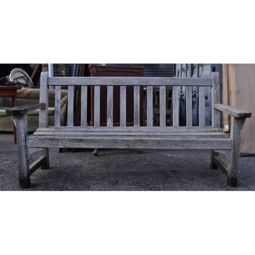 1242 - A set of 20th century teak wood garden furniture comprising of chairs, table and bench.