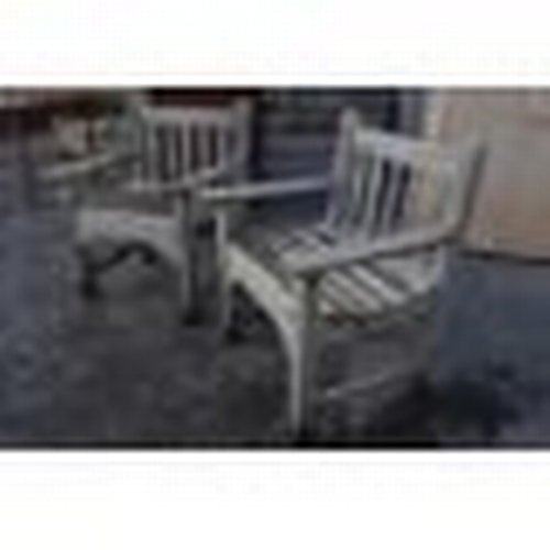 1242 - A set of 20th century teak wood garden furniture comprising of chairs, table and bench.