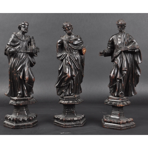 117 - A set of three 19th Century carved religious ecclesiastical figurines. Each modelled raised on pedes... 