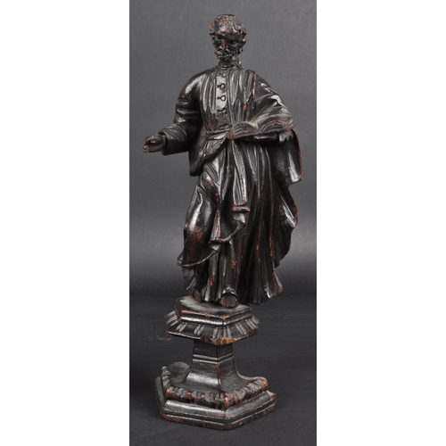 117 - A set of three 19th Century carved religious ecclesiastical figurines. Each modelled raised on pedes... 