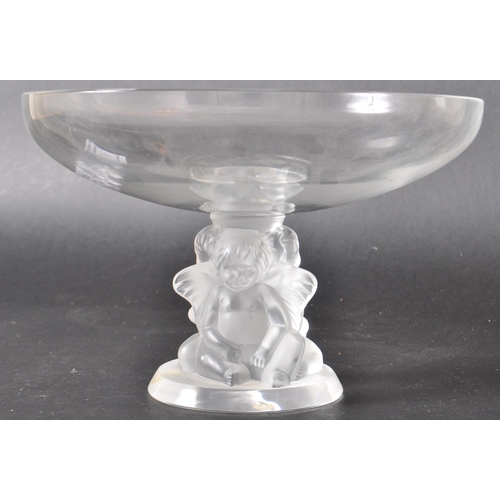 6 - Rene Lalique - A lalique French glass centrepiece bowl having a central triple cherub centrepiece co... 