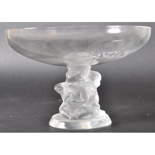 6 - Rene Lalique - A lalique French glass centrepiece bowl having a central triple cherub centrepiece co... 