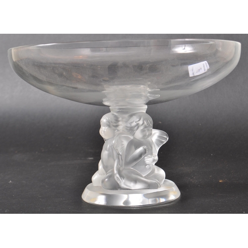 6 - Rene Lalique - A lalique French glass centrepiece bowl having a central triple cherub centrepiece co... 