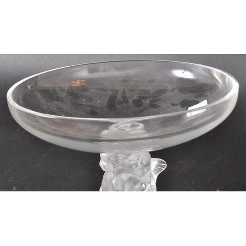 6 - Rene Lalique - A lalique French glass centrepiece bowl having a central triple cherub centrepiece co... 