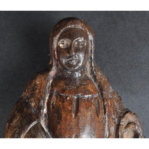 95 - An 18th Century carved oak / limewood religious ecclesiastical figurine depicting Mary the Mother. T... 
