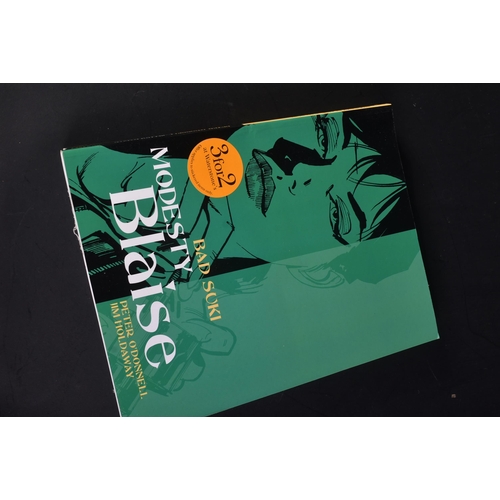 11 - Modesty Blaise - Graphic Novels - A collection of three Modesty Blaise comic books by Peter O'Donnel... 