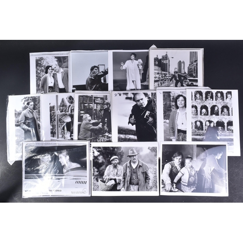 125 - Film Memorabilia - a large collection of assorted film lobby cards, promotional photographs, film st... 