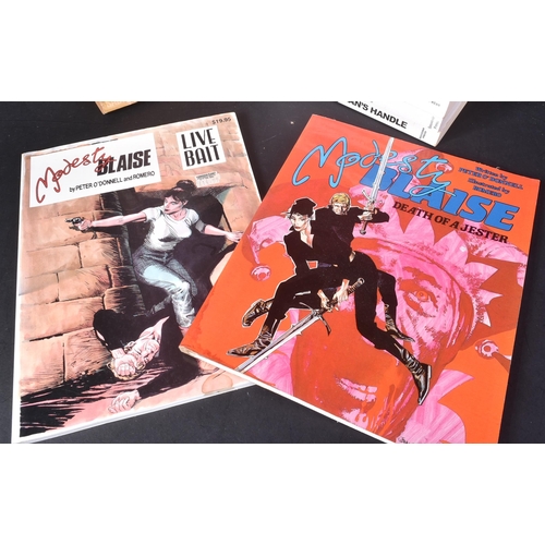 14 - Modesty Blaise - Graphic Novels / Comic Books - A large collection of Modesty Blaise novels & vintag... 