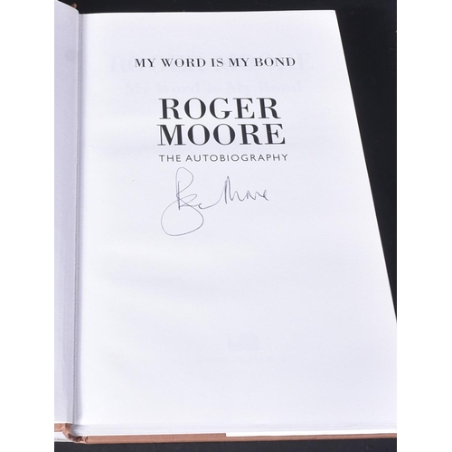 17 - James Bond 007 - Roger Moore (1927-2017) - My Word Is My Bond - autographed edition by Roger Moore o... 