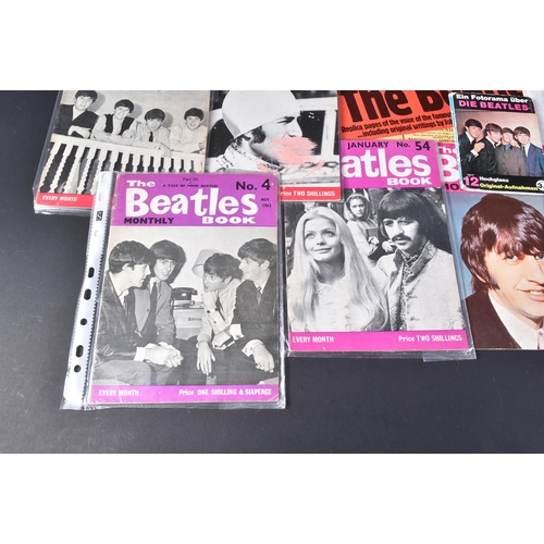 173 - The Beatles - a collection of assorted vintage Beatles related ephemera, comprising; a German 'Ein F... 