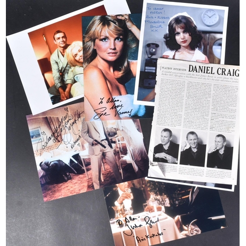 23 - A collection of James Bond related autographed photographs.  Autographs to include: Madeline Smith, ... 