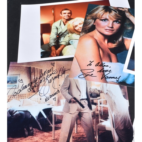 23 - A collection of James Bond related autographed photographs.  Autographs to include: Madeline Smith, ... 