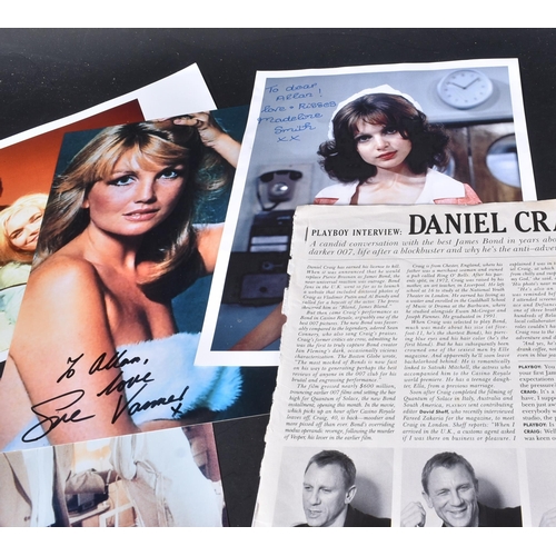 23 - A collection of James Bond related autographed photographs.  Autographs to include: Madeline Smith, ... 