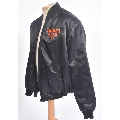 53 - The Doors - A 1990s The Doors UK Tour black satin jacket, issued to promote the biopic movie The jac... 