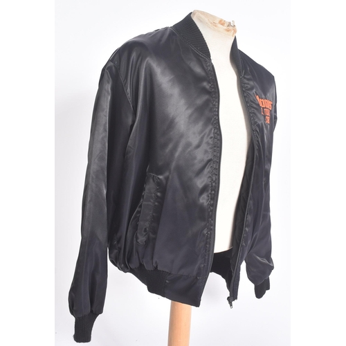 53 - The Doors - A 1990s The Doors UK Tour black satin jacket, issued to promote the biopic movie The jac... 