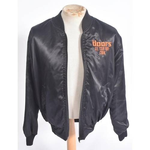 53 - The Doors - A 1990s The Doors UK Tour black satin jacket, issued to promote the biopic movie The jac... 