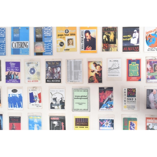 90 - Music Memorabilia - Backstage Passes - a large framed display of assorted backstage passes from vari... 