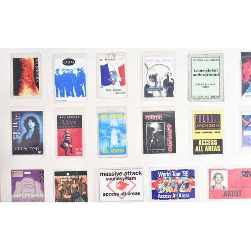 90 - Music Memorabilia - Backstage Passes - a large framed display of assorted backstage passes from vari... 