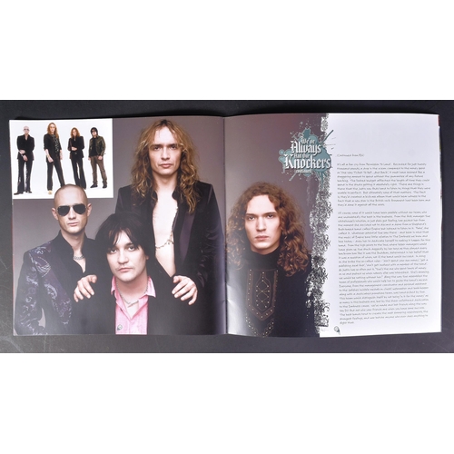 92 - The Darkness - an autographed tour programme by the band, including Justin and Dan Hawkins. All sign... 