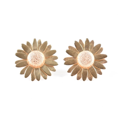 A pair of hallmarked 9ct yellow Clogau Welsh gold daisy stud earrings