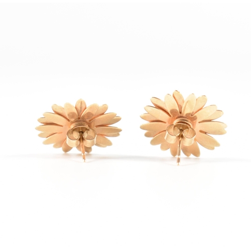 A pair of hallmarked 9ct yellow Clogau Welsh gold daisy stud earrings