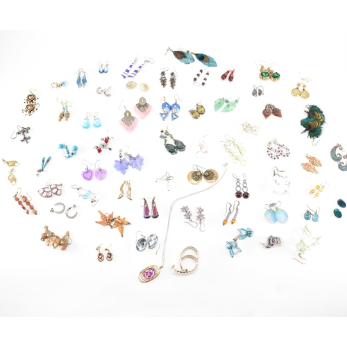 A collection of assorted costume jewellery earrings, totalling over 100