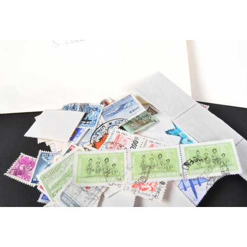 1121 - A collection of vintage 20th century International foreign franked stamps. The lot to include envelo... 