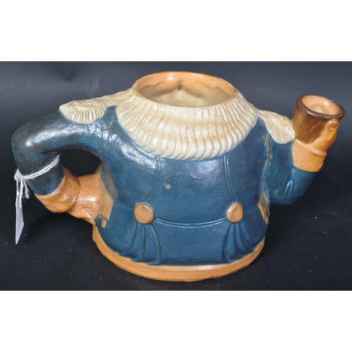 600 - A Victorian late 19th century Royal Doulton & Lambeth stoneware teapot 'The Best is Not Too Good' wi... 