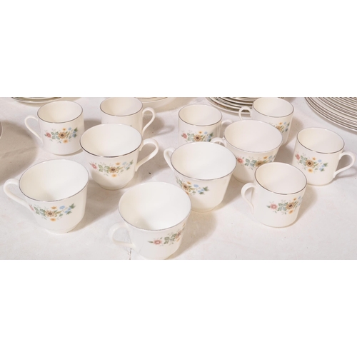 607a - A vintage 20th century Royal Doulton bone china tea and dinner service in the Pastorale pattern. Com... 