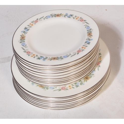 607a - A vintage 20th century Royal Doulton bone china tea and dinner service in the Pastorale pattern. Com... 